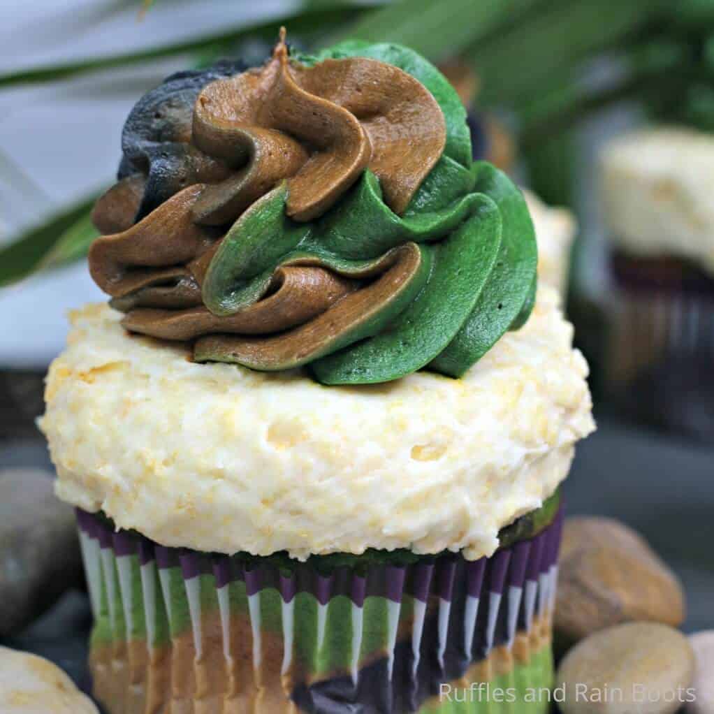 Vertical safari or jungle cruise cupcake with three color frosting technique, cereal frosting base, and camouflage cupcakes.