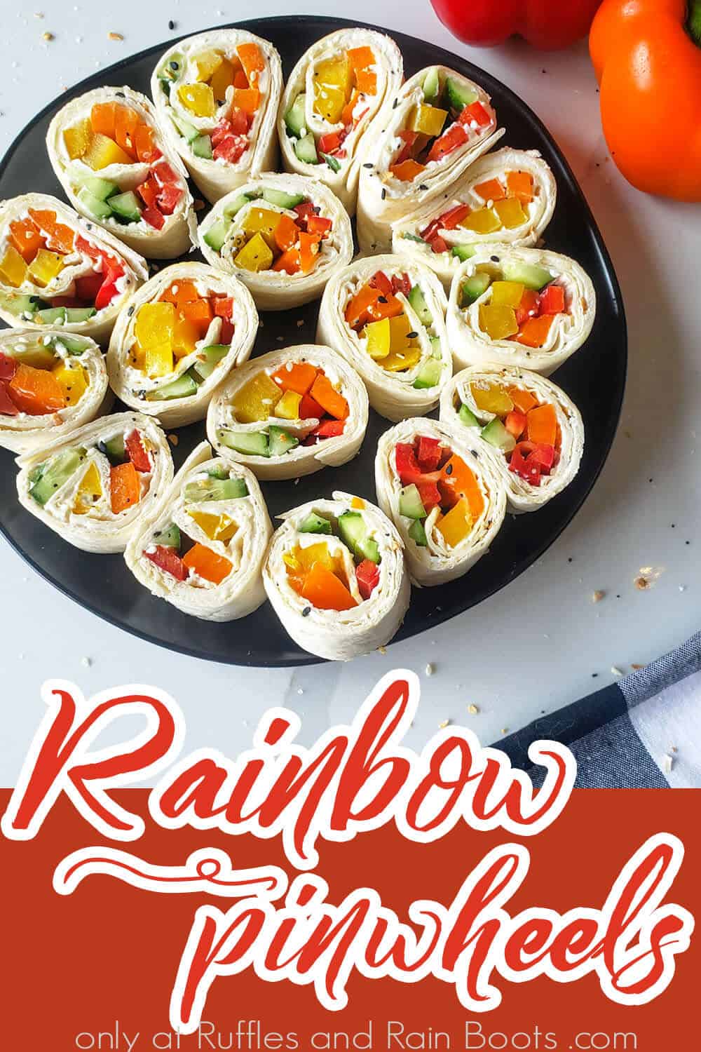 overhead view of easy rainbow pinwheel sandwich recipe with text which reads rainbow pinwheels