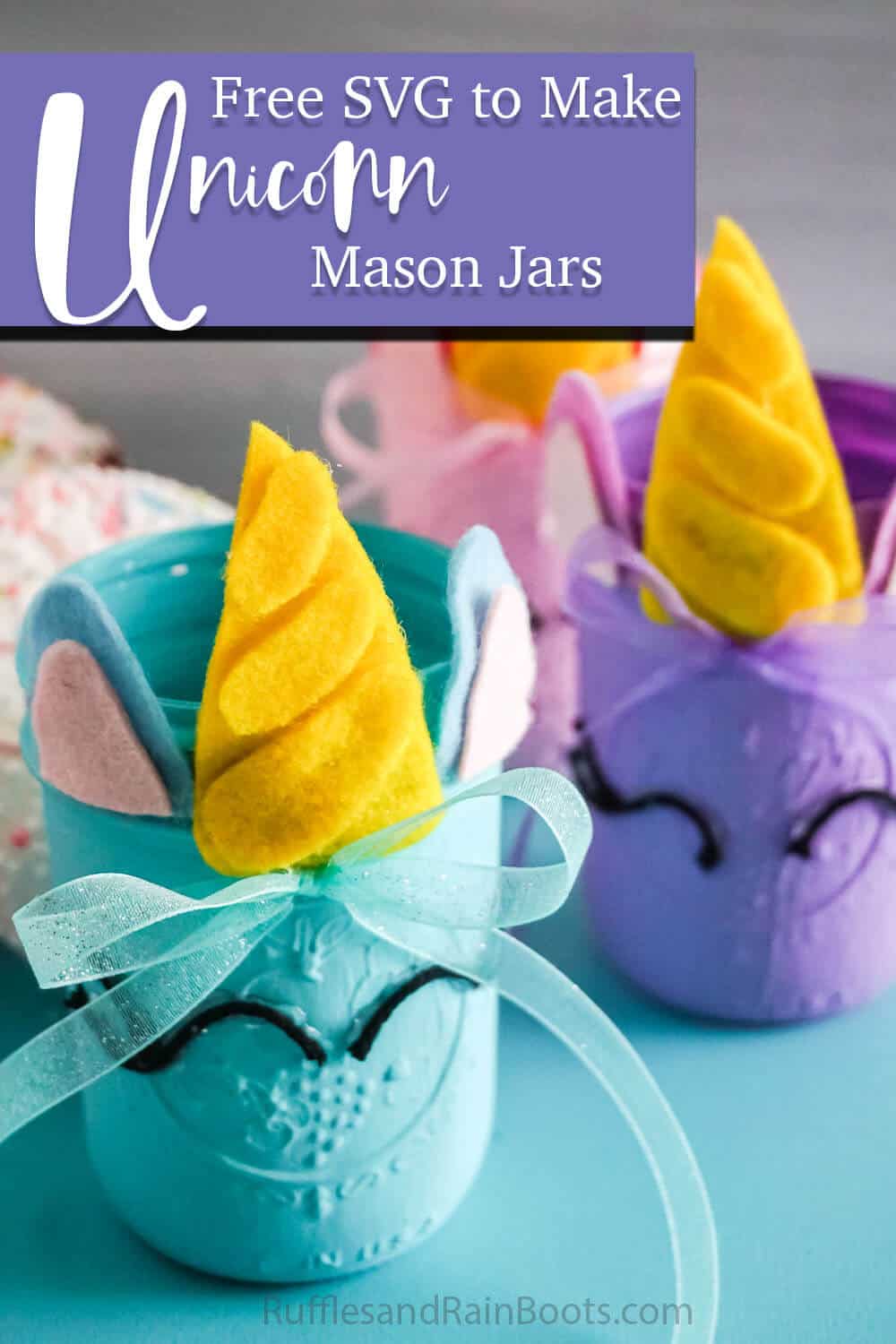 three unicorn jars on a blue table with text which reads free svgs to make unicorn mason jars