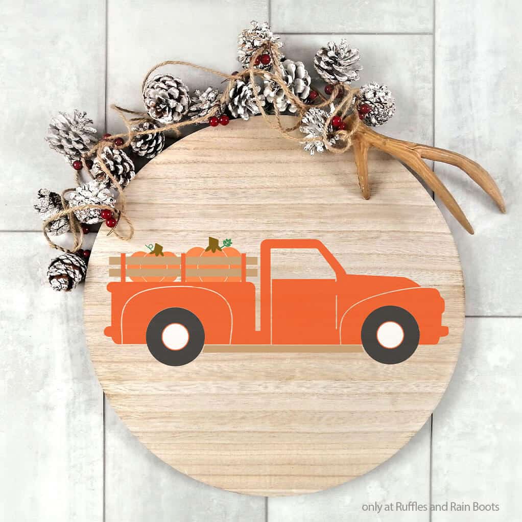 Wood round sign with a fall farm truck cut file set for Cricut or Silhouette machines.