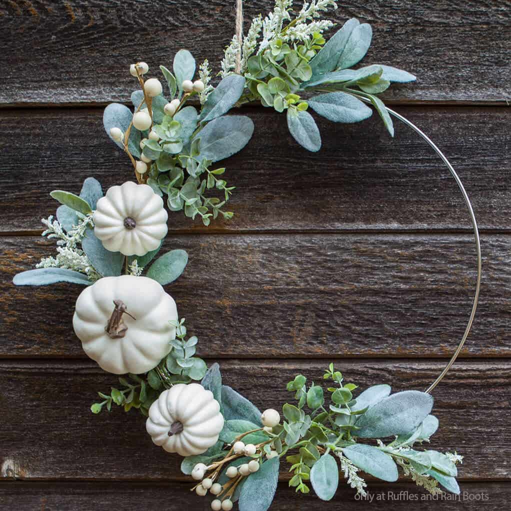 minimalist fall wreath diy craft for fall on a dark wood table