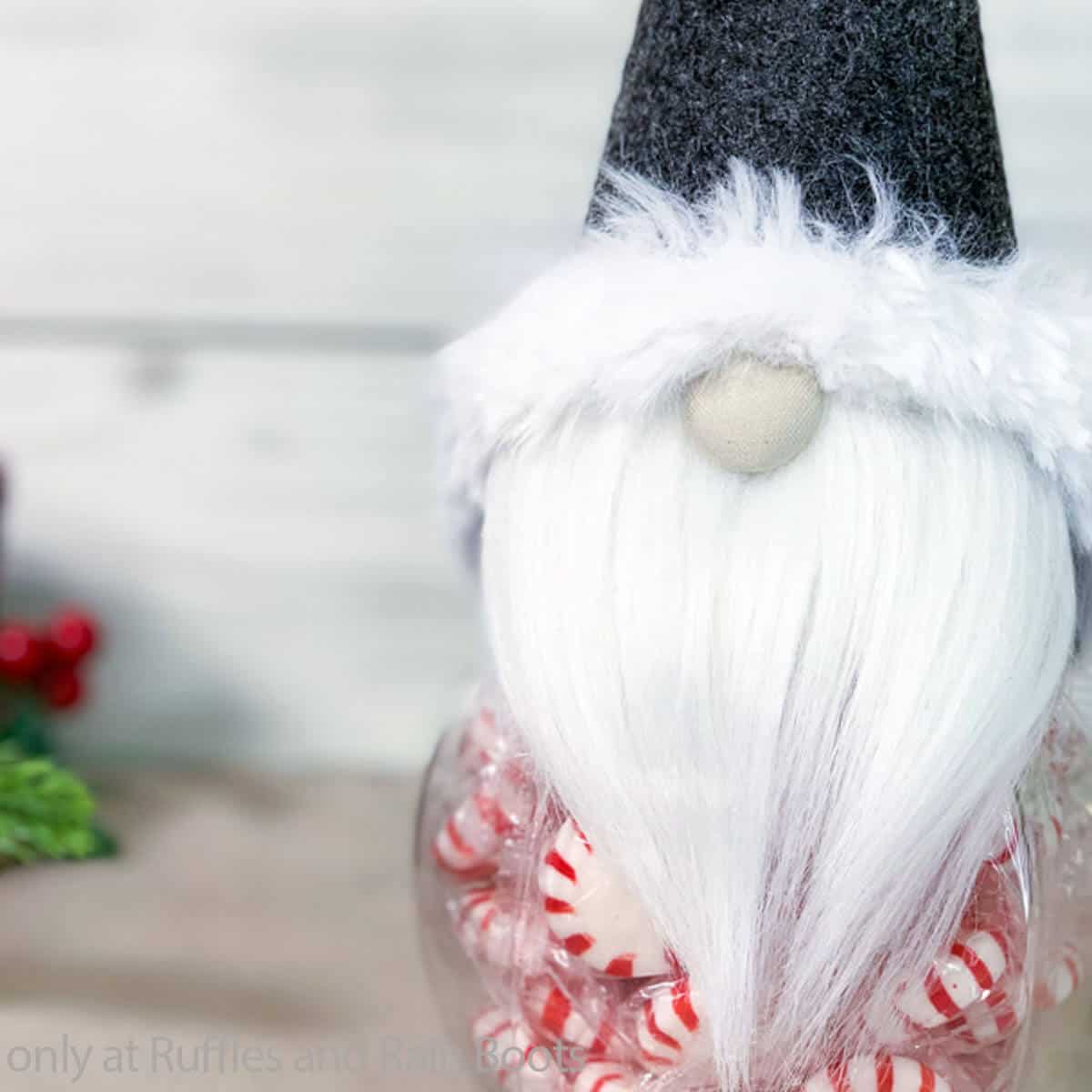 closeup of easy 5-minute gnome craft of a gnome treat jar topper