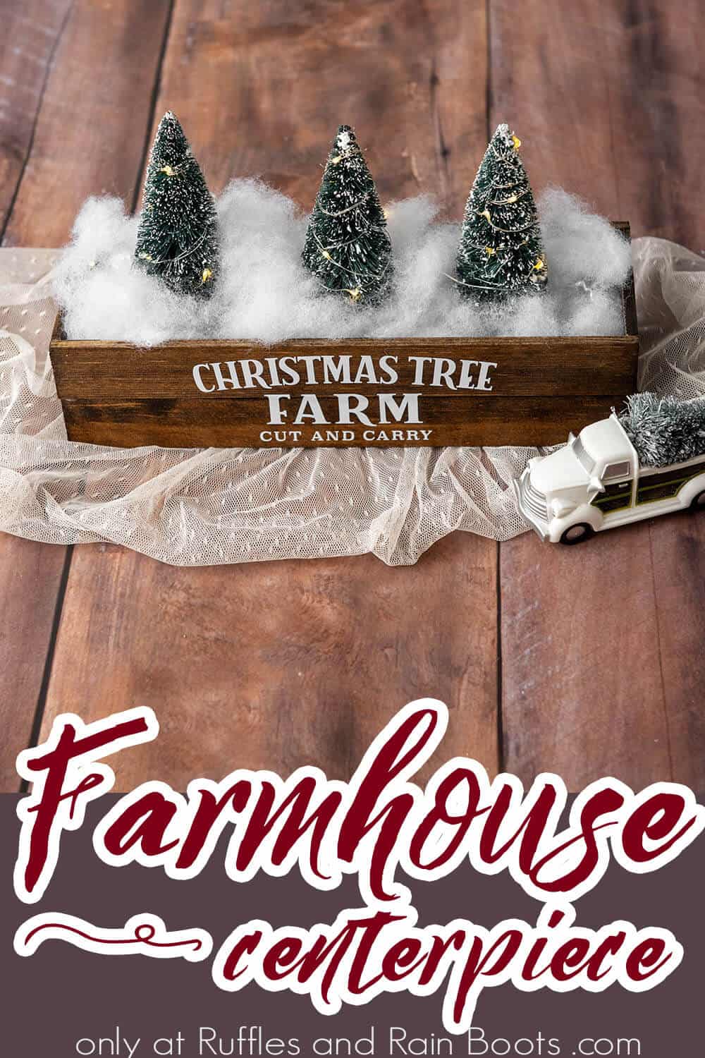 Beautiful farmhouse centerpiece with text which reads Christmas tree farm cut and carry on the stained wooden box.
