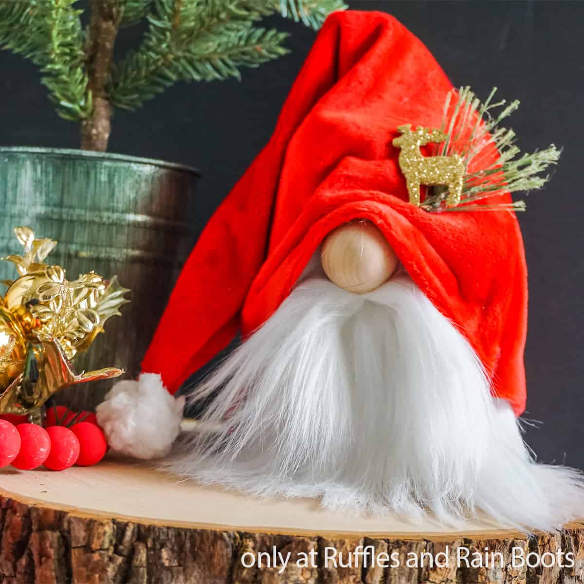 Santa gnome with red slouchy hat and white beard on dark Christmas background.