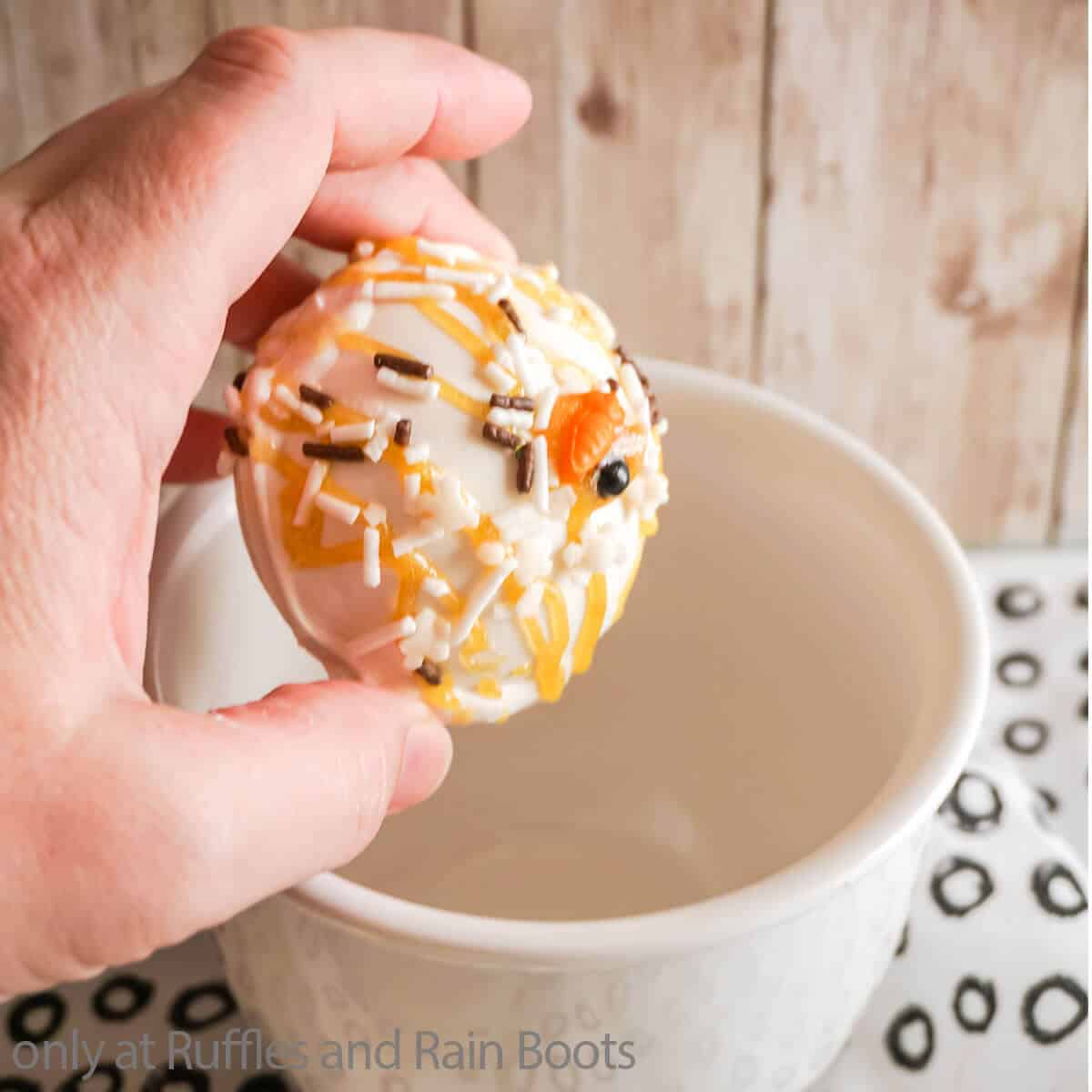 easy homemade hot cocoa bombs with snowman sprinkles