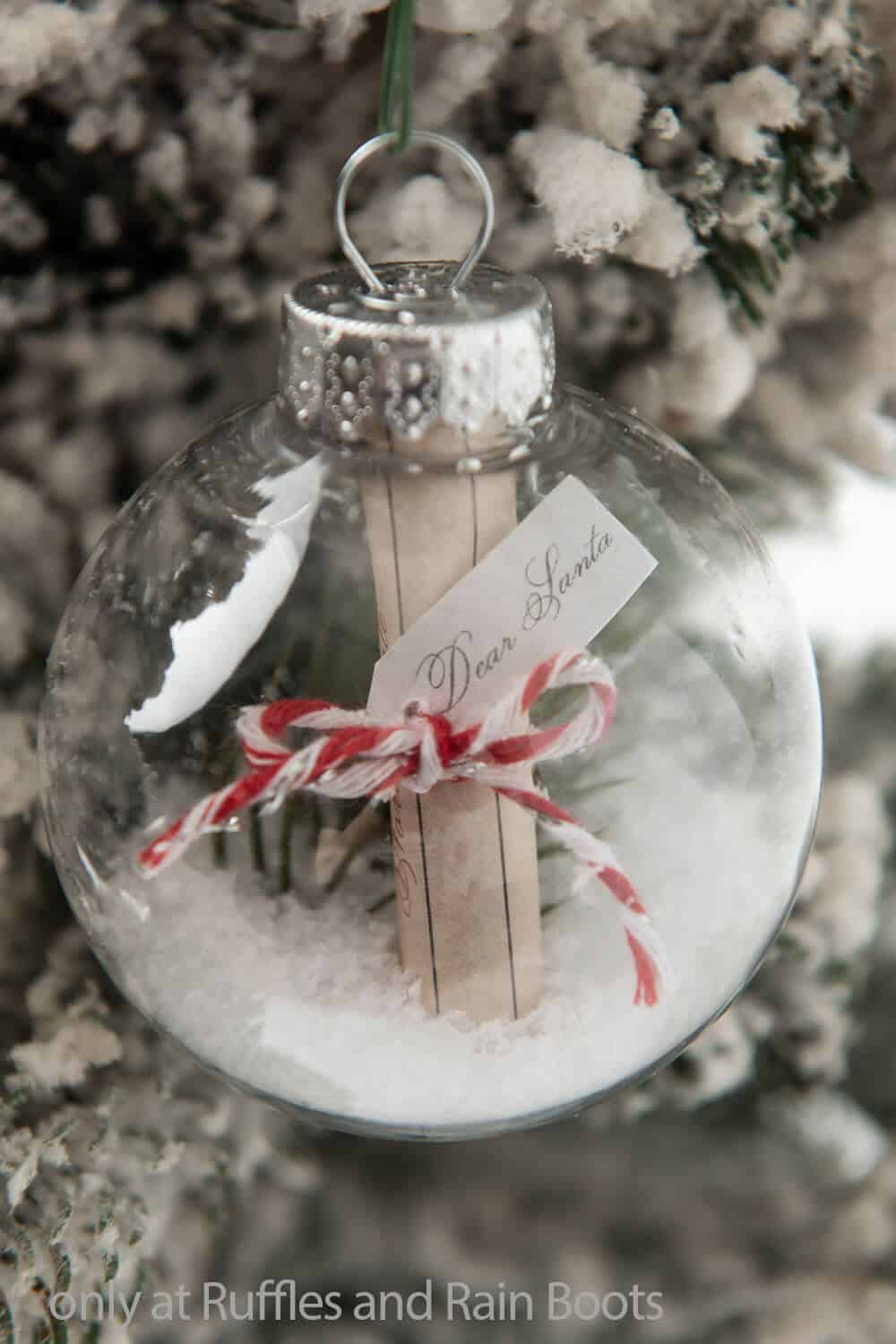 Close up farmhouse ornament idea with a keepsake Christmas ornament full of a letter to Santa.