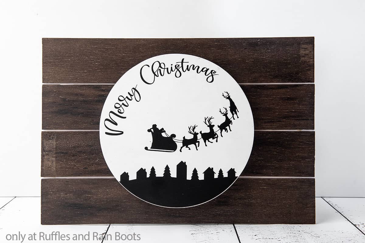 merry christmas scene cut file set on a wood round sign