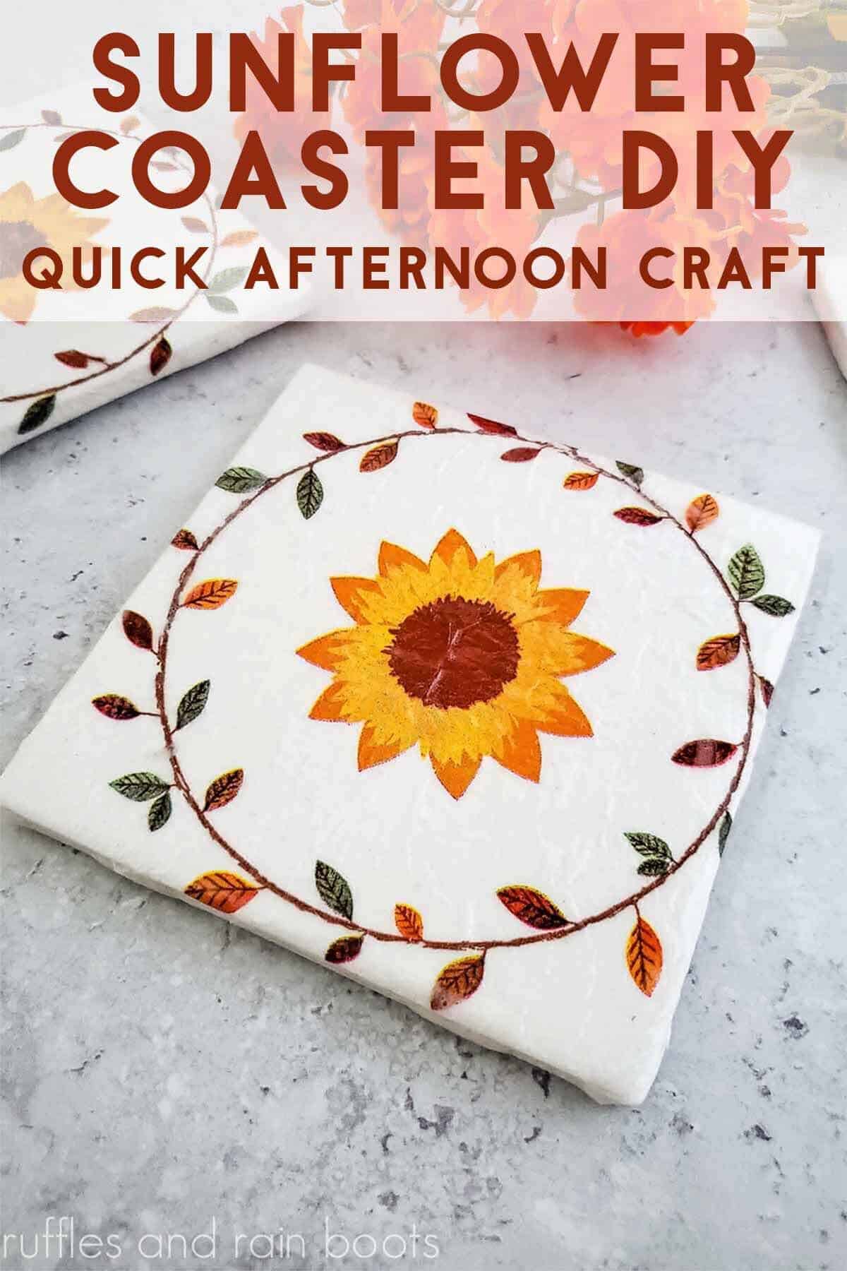 Vertical image of a close up of a sunflower napkin on a white tile with text which reads sunflower coaster DIY.