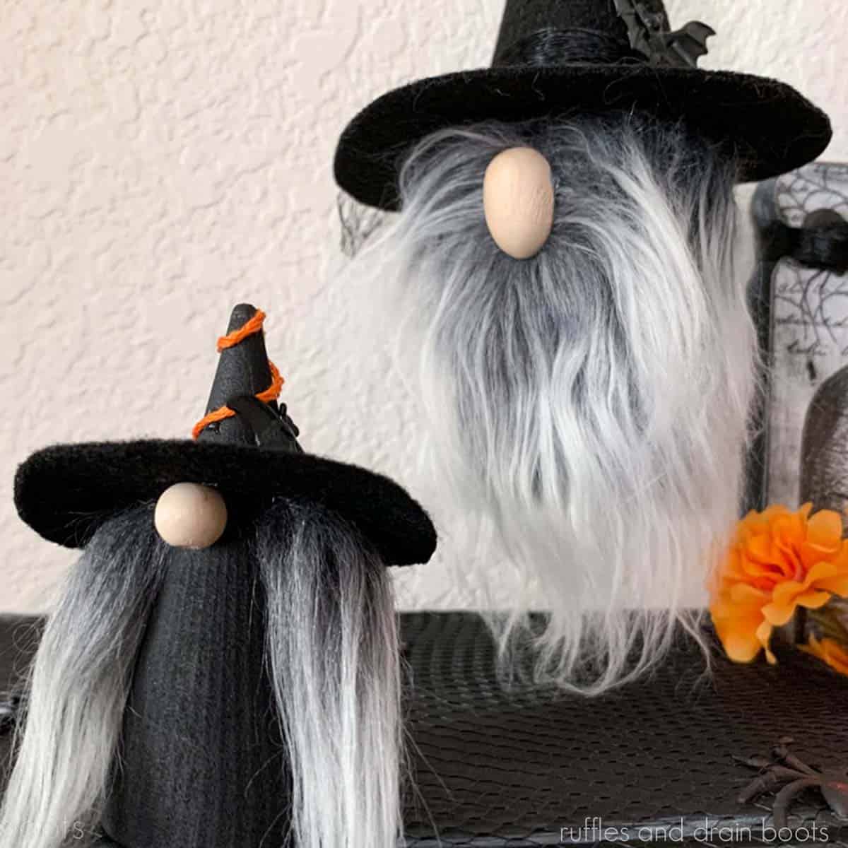 Square image of two Halloween gnomes made to look like witches.