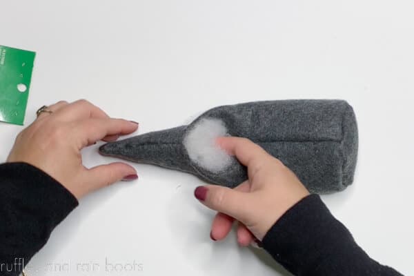 Crafter adding poly fill to the gnome body.