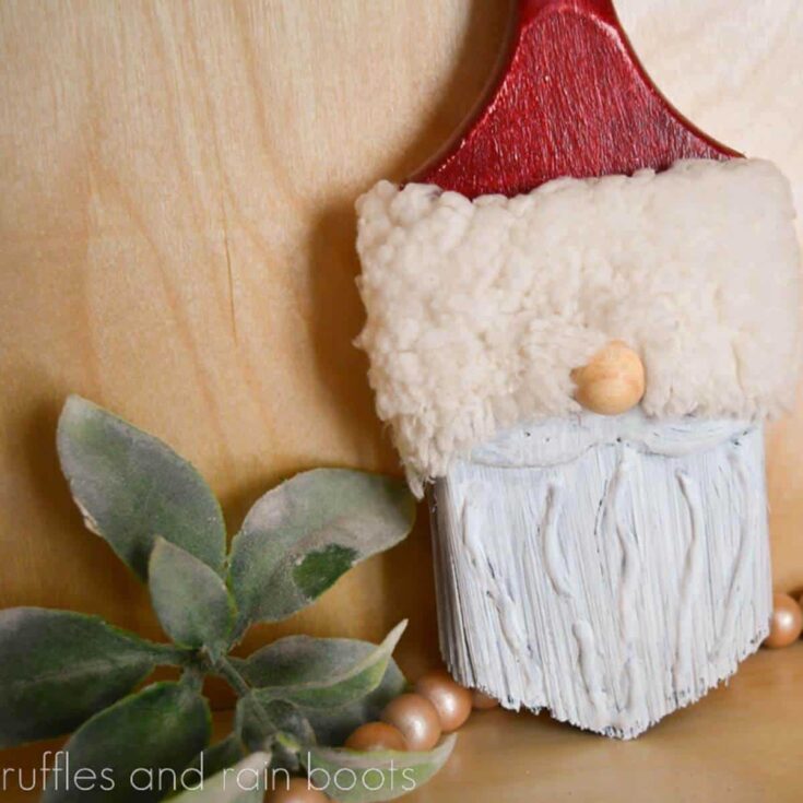 Square close up image of a Christmas paintbrush gnome made with a dimensional beard.