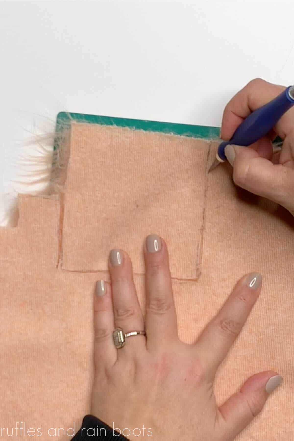 Crafter using an X-acto knife to cut the backing of pink faux fur.