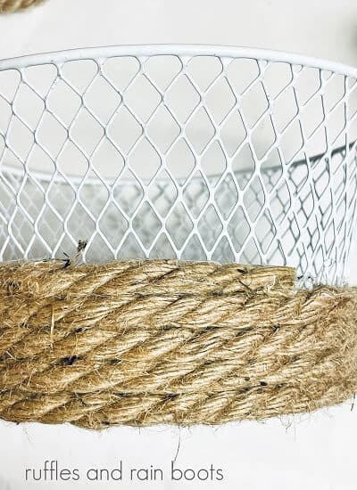 Close up of Farmhouse Rope Bunny Basket with jute rope on a white surface and a white background.