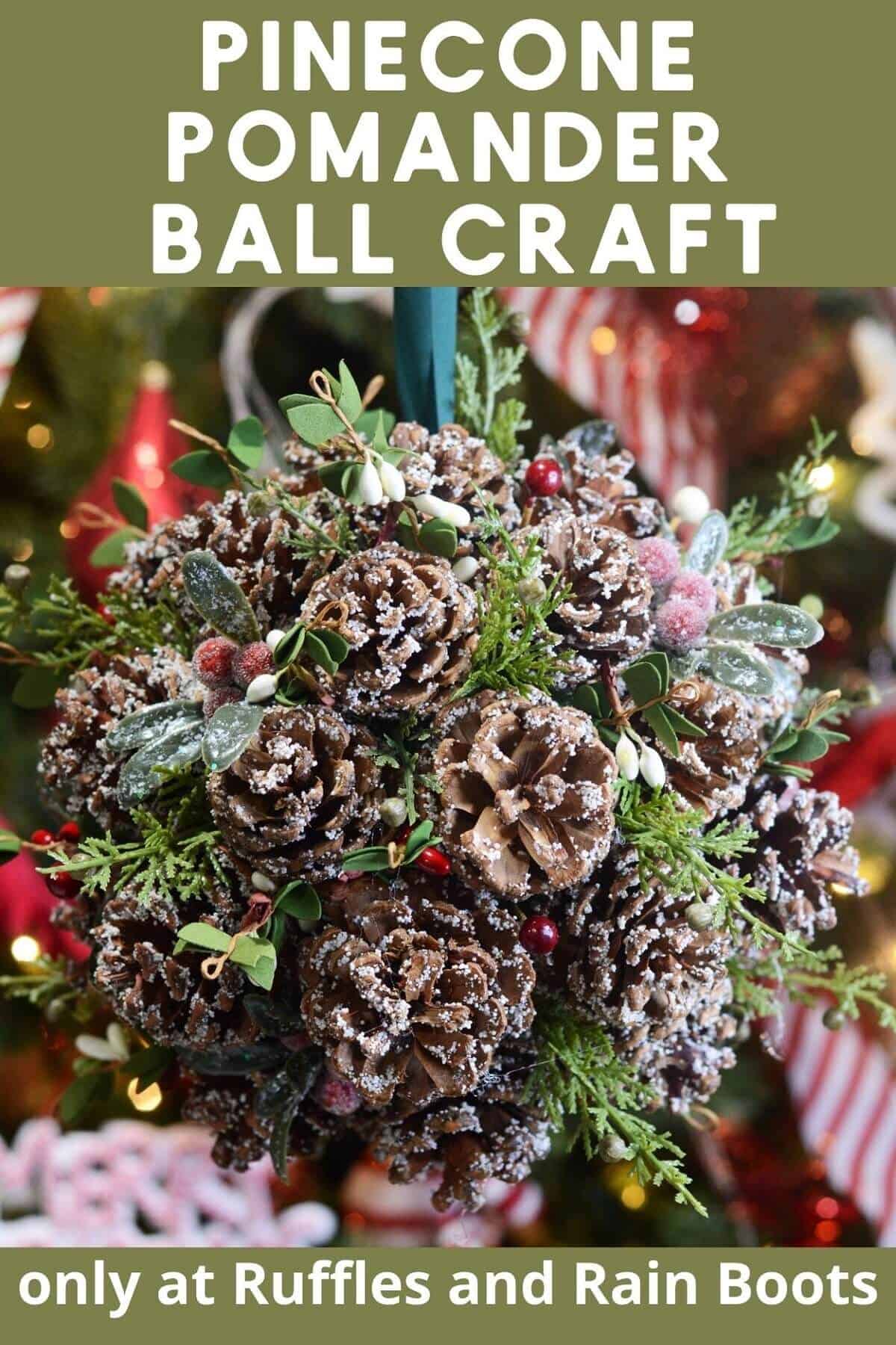 A vertical image of a hanging pinecone kissing ball with a Christmas tree in the background