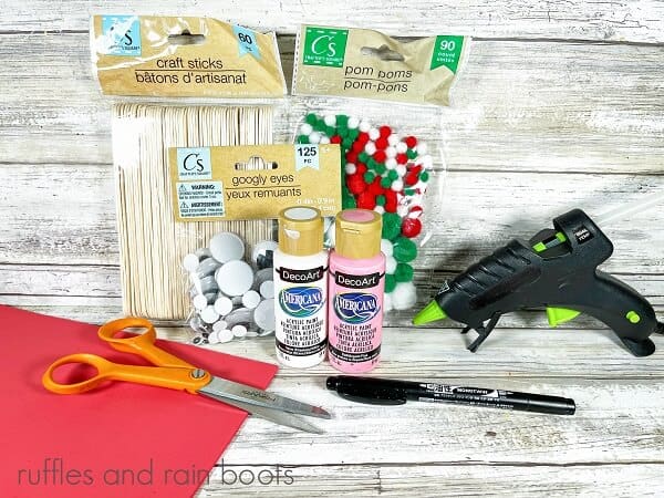 The supplies for the Craft Stick Santa DIY