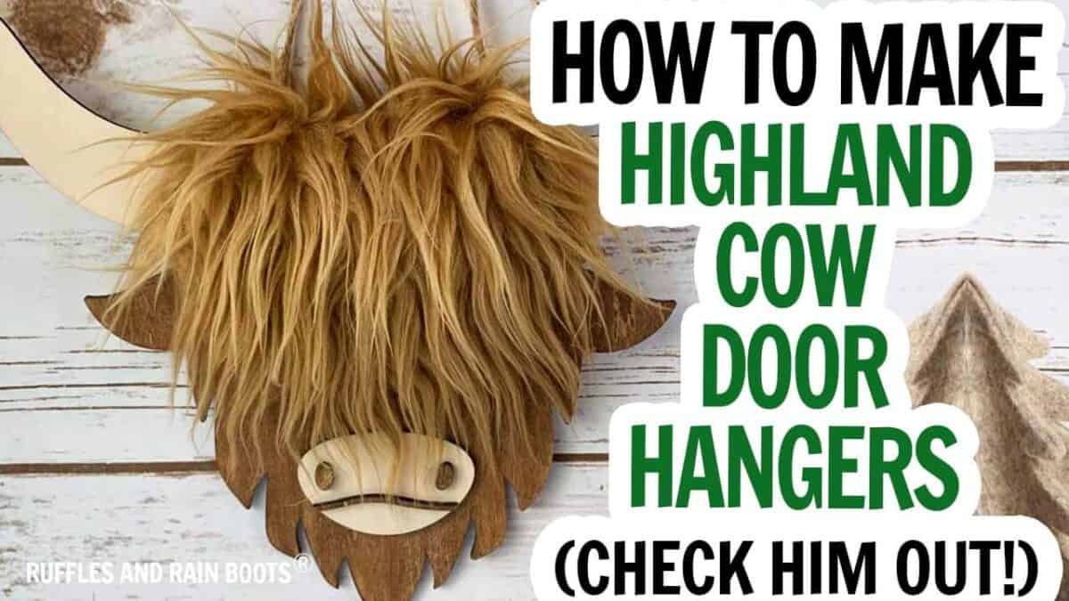 Video thumbnail image of a fur toper highland cow door sign on white wood with text which reads learn how to make highland cow door hangers.