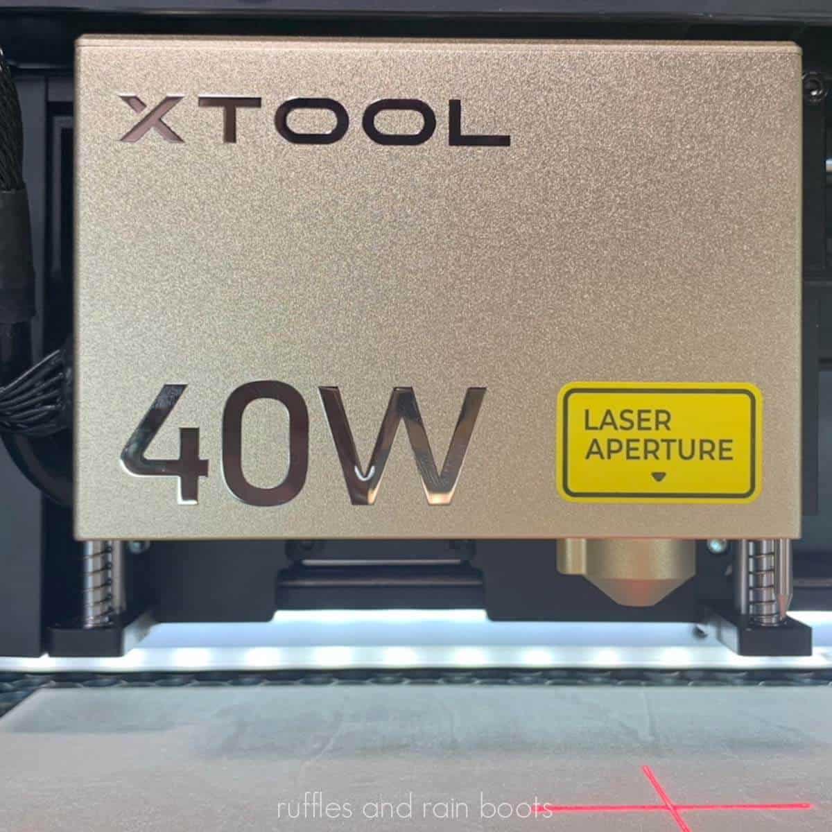 Square close up image of the xTool 40 watt laser module inside the S1.