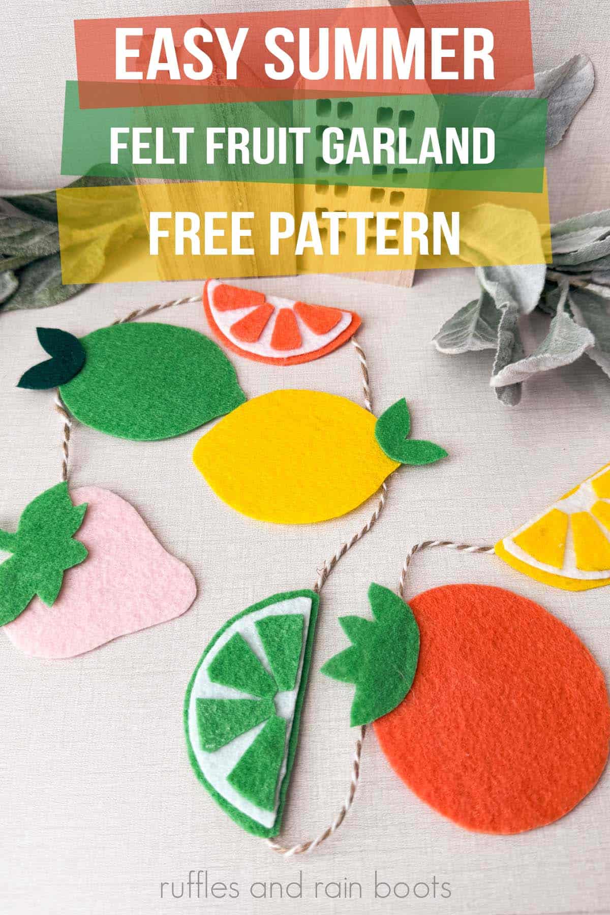 Vertical image close up of a summer garland made with felt into cute Kawaii fruit shapes.