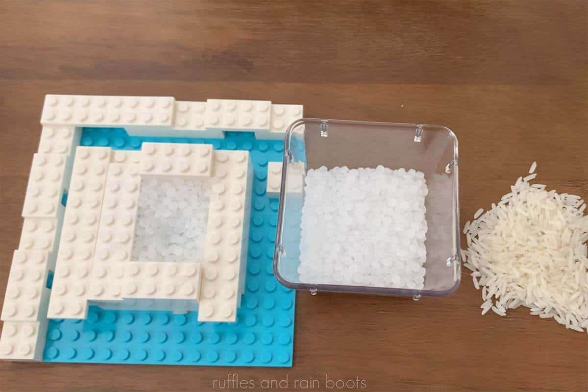 Horizontal image of a LEGO jig with filler used for laser engraving.