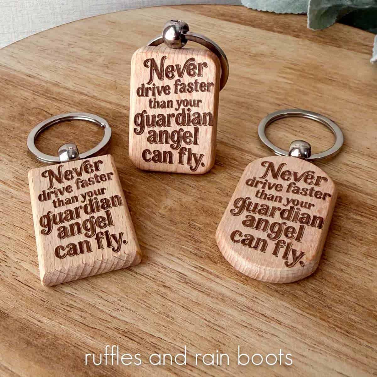 Square close up image of three keychains laser engraved with a funny reminder to drive safely.